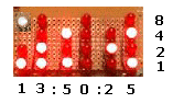 Imagen real del reloj de 21 LEDs para lectura binaria.